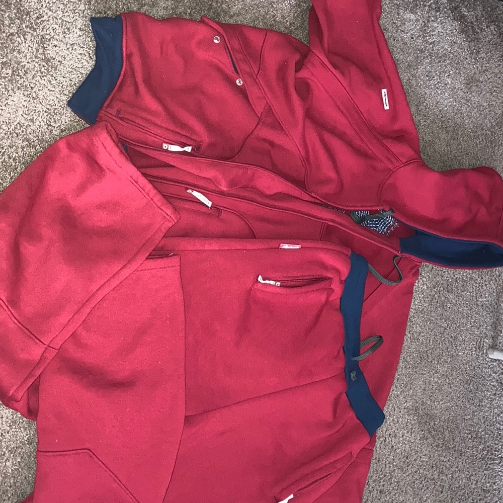 Akadmkes  sweat suit!  Color red and blue.